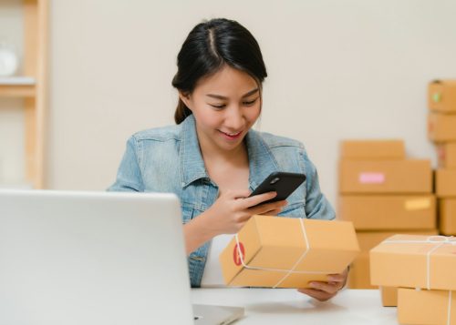 Online seller packing an order sourced from China